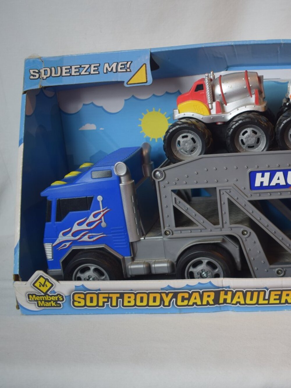 New Members Mark Soft Body Car Hauler Toy with Rev-N-Go Vehicles